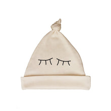 Bugged Out sleepy eyes organic cotton baby hat - natural